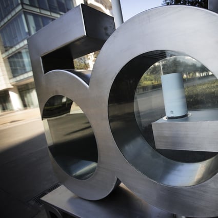 A Huawei mobile device is displayed inside a 5G sign at its research and development centre in Shenzhen in south China's Guangdong province, Tuesday, Dec. 18, 2018. Photo: AP