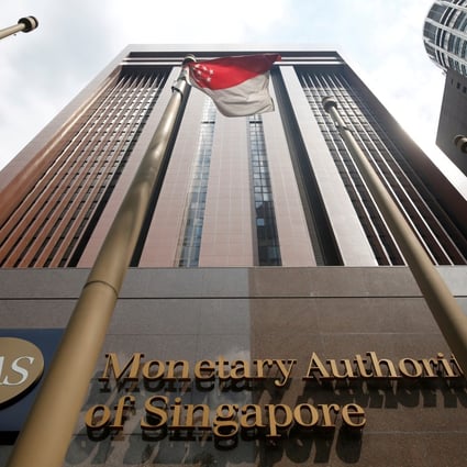 Singapore’s central bank increased the slope of the policy band twice last year in efforts to control rising price pressures and strengthen its currency in its first such tightening moves in six years. Photo: Reuters