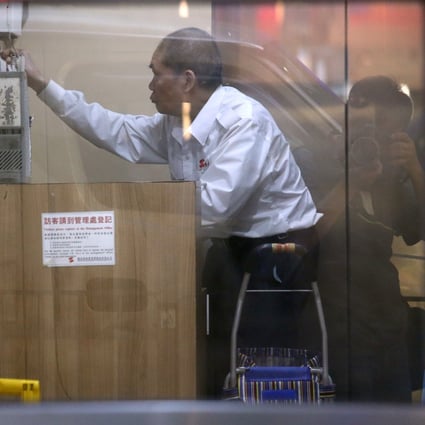 Security guards are the most likely of Hong Kong workers to put in long hours. Photo: Dickson Lee