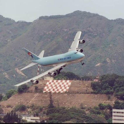In Kai Tak, pilots landing on Runway 13 would make the final approach after an essential turn at the “checkerboard” painted into a hill. Photo: Twitter