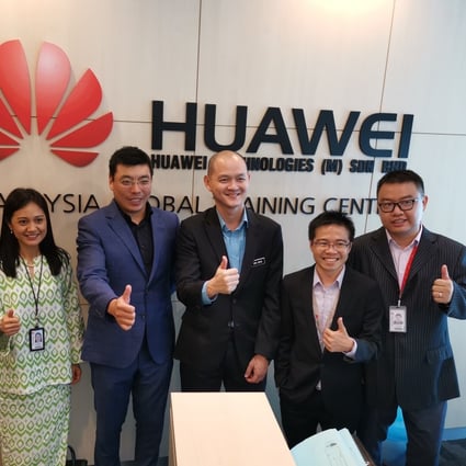Dr Ong Kian Ming, deputy minister of international trade and industry (third from right), at Huawei’s global training centre in Malaysia. Photo: Handout