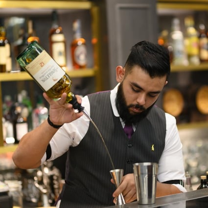 A bartender at The Monarchy, Singapore.