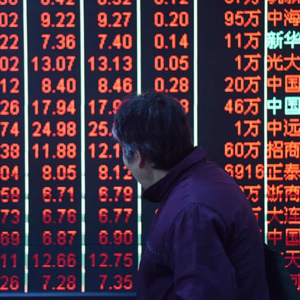 Traders said upbeat quarterly data bolstered sentiment that growth momentum had bottomed, helping push the Shanghai Composite Index to a one-year high on Wednesday. Photo: Xinhua