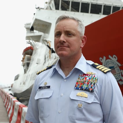 Captain John Driscoll next to the US Coast Guard vessel Bertholf during a port stop in Hong Kong this month. SCMP / K. Y. Cheng