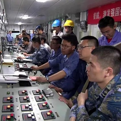Technicians are seen at the control panels of China’s new aircraft carrier in footage from its recent sea trial. Photo: Handout