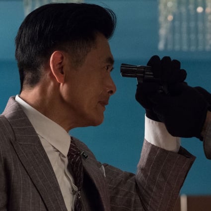 Chow Yun-fat (left) and Aaron Kwok in a scene from Project Gutenberg, a successful co-production which was awarded best movie at the Hong Kong Film Awards earlier this month.