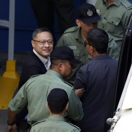 Benny Tai is escorted to Lai Chi Kok Reception Centre. Photo: Robert Ng