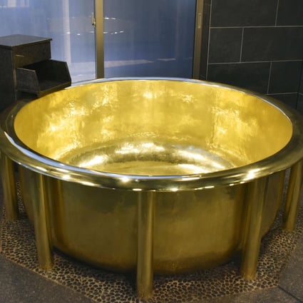 A 154.2kg bathtub made of 18-carat gold at Huis Ten Bosch’s hot spring resort in Sasebo, Nagasaki. Photo: Kyodo