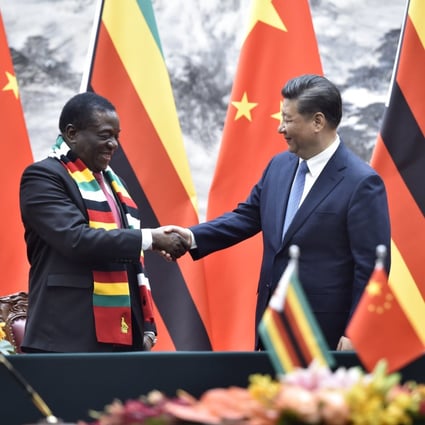Zimbabwean President Emmerson Mnangagwa shakes hands with Chinese President Xi Jinping in Beijing in April 2018. China surpassed the US as the top trading partner of Africa in 2009. Photo: EPA-EFE