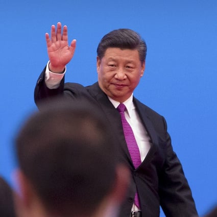 Xi Jinping waves as he leaves after a press conference at the closing of the Belt and Road Forum in Beijing on Saturday. Photo: AP