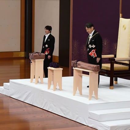 Emperor Naruhito (right) inherits the imperial regalia. Photo: AFP