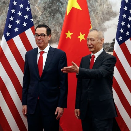 Chinese Vice Premier Liu He shows the way to US Treasury Secretary Steven Mnuchin and US Trade Representative Robert Lighthizer as they proceed to their meeting at the Diaoyutai State Guesthouse in Beijing on May 1, 2019. Photo: AFP