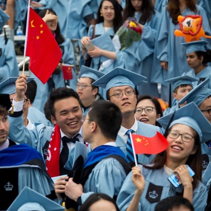 Graduates wave China flags during the commencement ceremony of the 264th Academic Year of Columbia University in New York. Photo: Xinhua