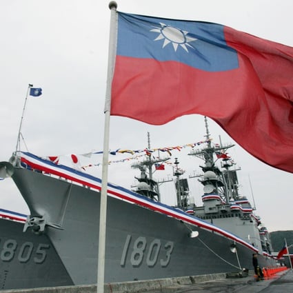 Taiwan’s flag flies alongside two US-made destroyers. Photo: AP