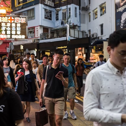 The amount of innovation underway makes long term forecasting problematic, especially when it comes to the future needs for urban space, writes Nicholas Brooke. Pedestrians in the popular shopping district of Causeway Bay in Hong Kong. Photo: AFP