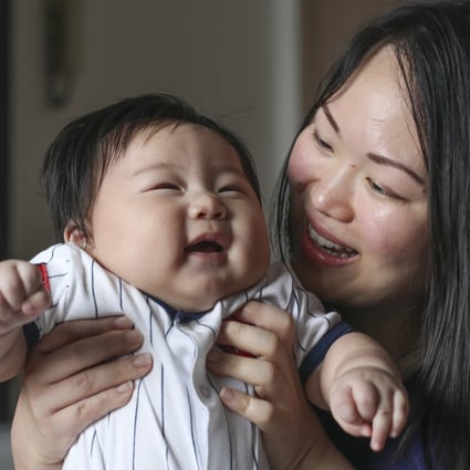 Mother Mei Tan and baby Jordan Ma, four months at their home in South Horizons, Hong Kong. Photo: Xiaomei Chen