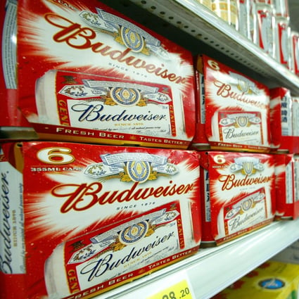 Packs of Budweiser beers are displayed in a Shanghai supermarket. Photo: AFP
