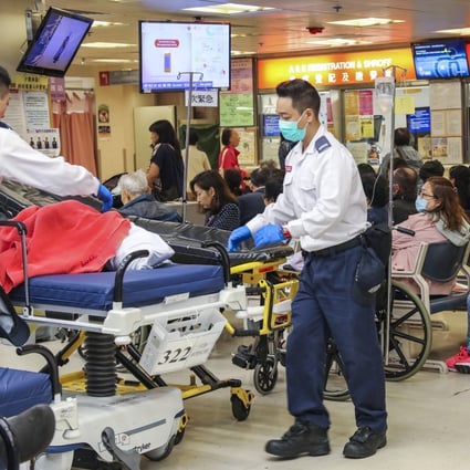 Hospital staff wheel a trolley through the crowded Accident and Emergency Department at Queen Elizabeth Hospital in Yau Ma Tei. Photo: Dickson Lee