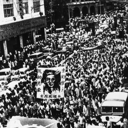 Protesters carry a portrait of slain worker Lim Soon Seng during a 1969 march in Kuala Lumpur. Behind the portrait is Lim’s coffin. He was killed in a clash with police on May 4 that year, fuelling racial tensions. Days later riots erupted. Photo: AP