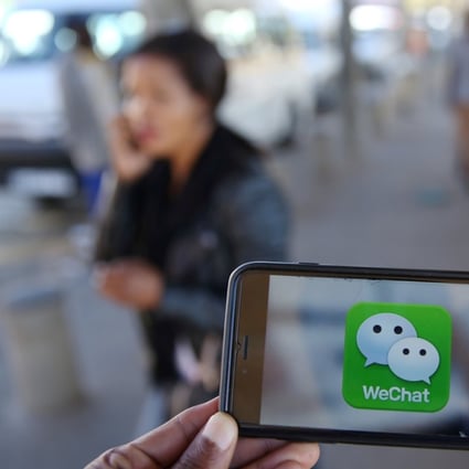 A WeChat logo displayed on a mobile phone. Photo: Reuters