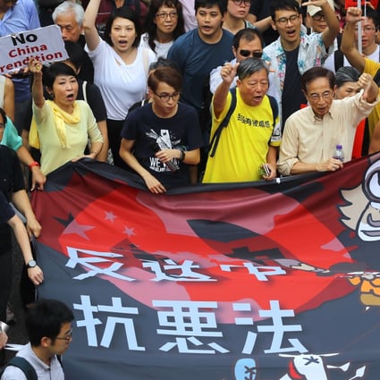 Lee Cheuk-yan, in yellow shirt, and Martin Lee Chu-ming, in beige shirt, at a rally in Hong Kong on April 28 opposing the extradition bill. Both men were part of a delegation testifying in Washington on Wednesday. Photo: Edmond So