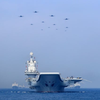 China’s navy stages a display in the South China Sea, parts of which are claimed by a number of its neighbours. Photo: Reuters