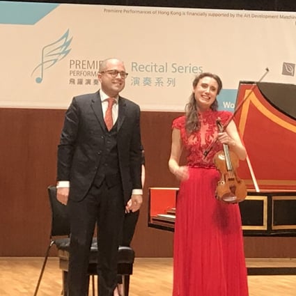 Violinist Jennifer Pike and Iranian-born harpsichordist Mahan Esfahani receive the applause of the audience at Hong Kong City Hall Concert Hall. Photo: Premiere Performances