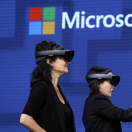 Members of a design team at Cirque du Soleil demonstrate use of Microsoft's HoloLens device in helping to virtually design a set at the Microsoft Build 2017 developers conference in Seattle. Photo: AP.