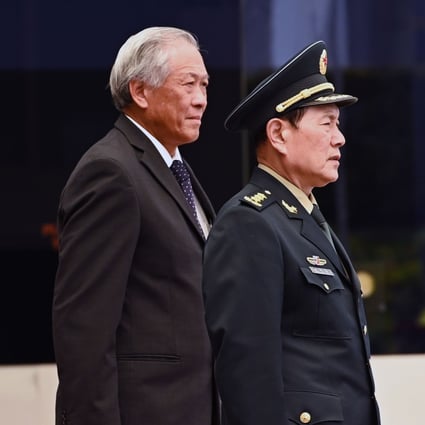 China’s Defence Minster Wei Fenghe (right) and his Singaporean counterpart Ng Eng Hen. Photo: AFP