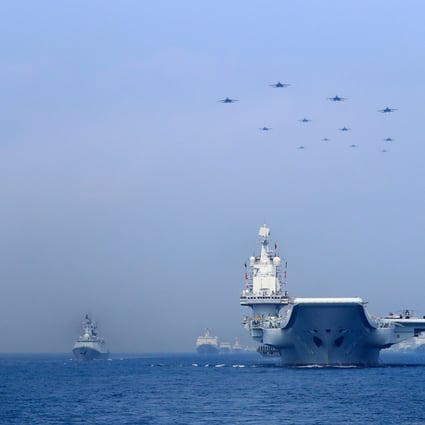 Chinese warships sail through the South China Sea. Photo: Reuters