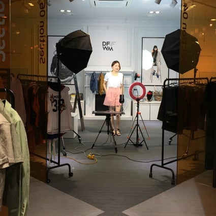 Ding Xiaoping showcases clothes for Dongdaemun Fashion Wholesale Market. Photo: Crystal Tai