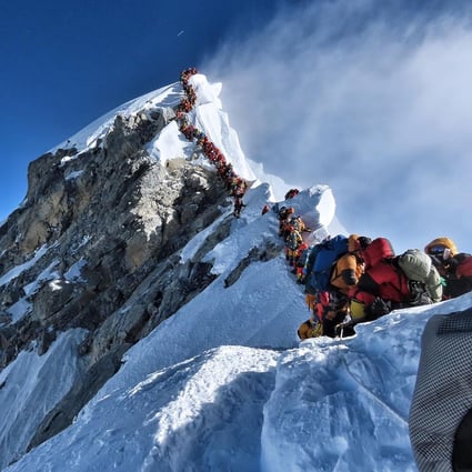 Climbers line up for hours to reach the summit of Mount Everest on May 22. Photo: @nimsdai Project Possible via AFP