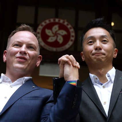 Scott Adams and Angus Leung after their victory in the city’s top court. Photo: Sam Tsang