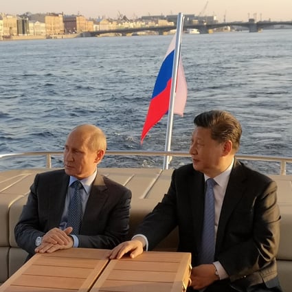 Russian President Vladimir Putin and Chinese President Xi Jinping, who have voiced mutual admiration on many occasions, sail towards St Petersburg on the Neva River. Photo: Xinhua