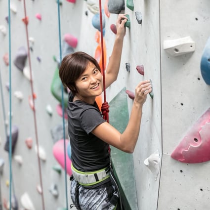 For Tan Hooi Ling, indoor rock-climbing is an activity that requires a good balance between strategy and action. Photo: SCMP