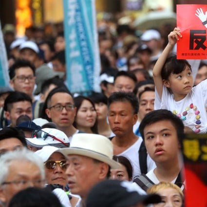 Protesters march from Causeway Bay to government headquarters in Admiralty on Sunday to protest against the extradition bill. Photo: Edmond So