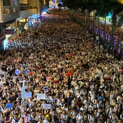 Such was the size of the crowds, they were still flocking to the rallying point long after the first marchers had left, and the tail end of the rally was still in Causeway Bay as night fell. Photo: Warton Li