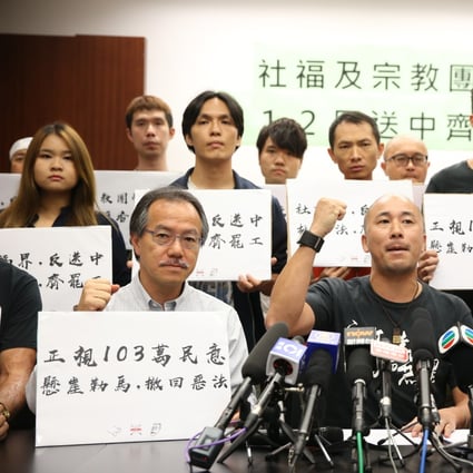 Officials, including lawmaker Fernando Cheung (front left), representing the welfare and religion sectors at a news conference on Tuesday. Photo: Winson Wong