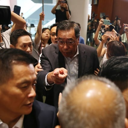 Legislative Council President Andrew Leung Kwan-yuen leaves a media briefing on Tuesday that was interrupted by pan-democrat lawmakers protesting against the extradition bill. Photo: Winson Wong