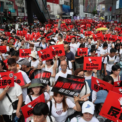 Demonstrators march from Causeway Bay to government offices in Admiralty on Sunday to protest against the proposed extradition bill. Photo: SCMP/Robert Ng