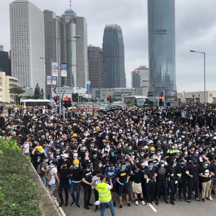 Demonstrators block Lung Wo Road in Admiralty in Hong Kong as part of a protest against the government’s contentious extradition bill. Photo: K.Y. Cheng