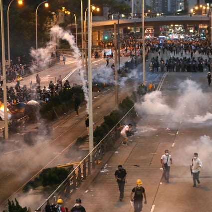 Tear gas is fired outside Pacific Place in Admiralty. Photo: Nora Tam