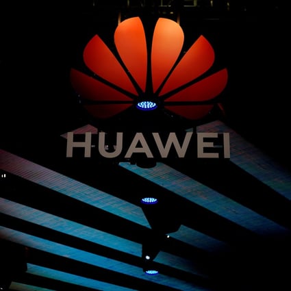 A Huawei logo at the Shanghai car show in April. Photo: Reuters