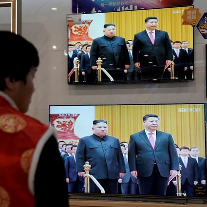 Television screens at an electronics store in Beijing show footage of North Korean leader Kim Jong-un’s meeting with Chinese President Xi Jinping in January. Photo: Reuters