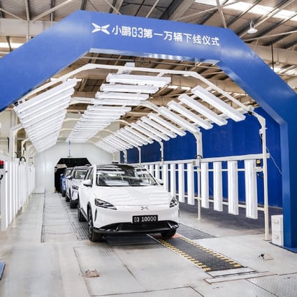 The 10,000th unit of Xpeng’s G3 all-electric sports-utility vehicle rolls off the carmaker’s contract manufacturer Haima Automobile Group in the Henan provincial capital of Zhengzhou on June 18, 2019. Photo: SCMP/Handout