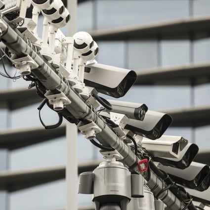 Surveillance cameras manufactured by Hikvision on a post at a testing station near the company’s headquarters in Hangzhou, China. Photo: Bloomberg