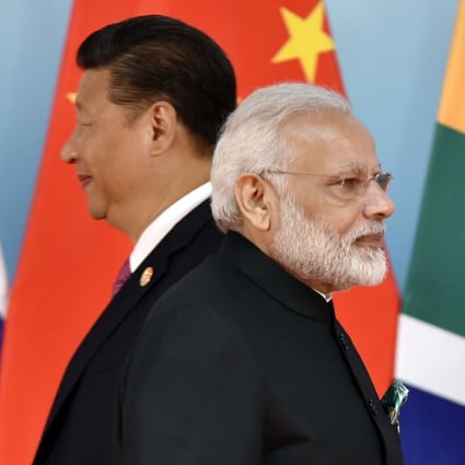 Chinese President Xi Jinping and Indian Prime Minister Narendra Modi at the BRICS Summit at the Xiamen International Conference and Exhibition Center in 2017. Photo: AFP