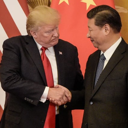 US President Donald Trump shakes hand with China's President Xi Jinping at the end of a press conference at the Great Hall of the People in Beijing in November 2017. Photo: AFP