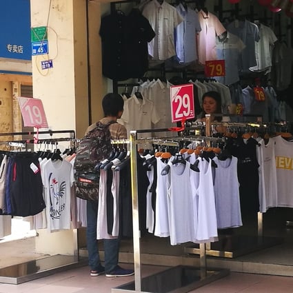 Migrant worker Li Zhong spent 79 yuan (US$11.5) on a new shirt ahead of his interview. Photo: He Huifeng