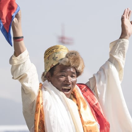 Kami Rita Sherpa celebrates setting a new world record for climbing Mount Everest. Photo: EPA